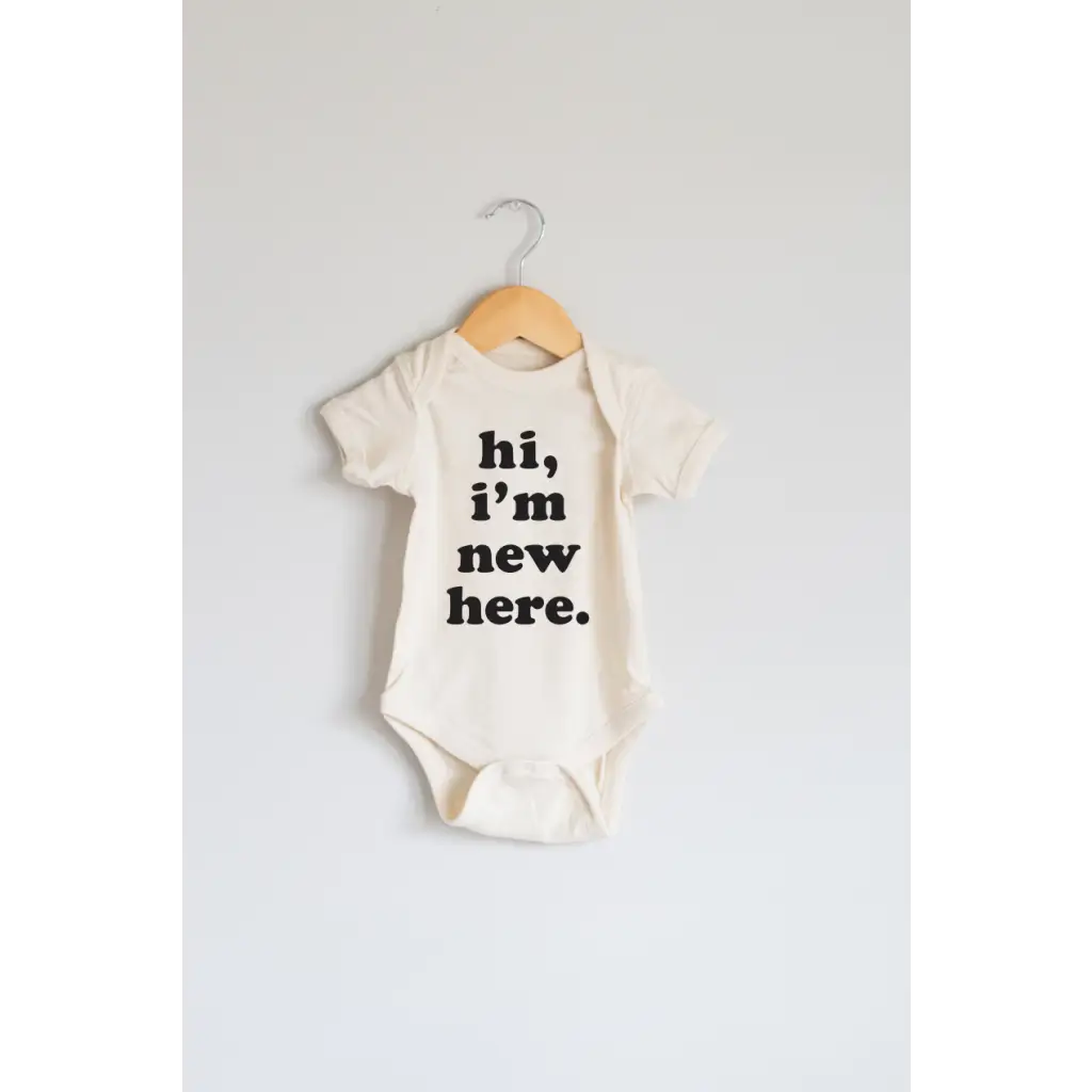 "Hi I'm New Here." Organic Cotton Baby Onesie - Polished Prints