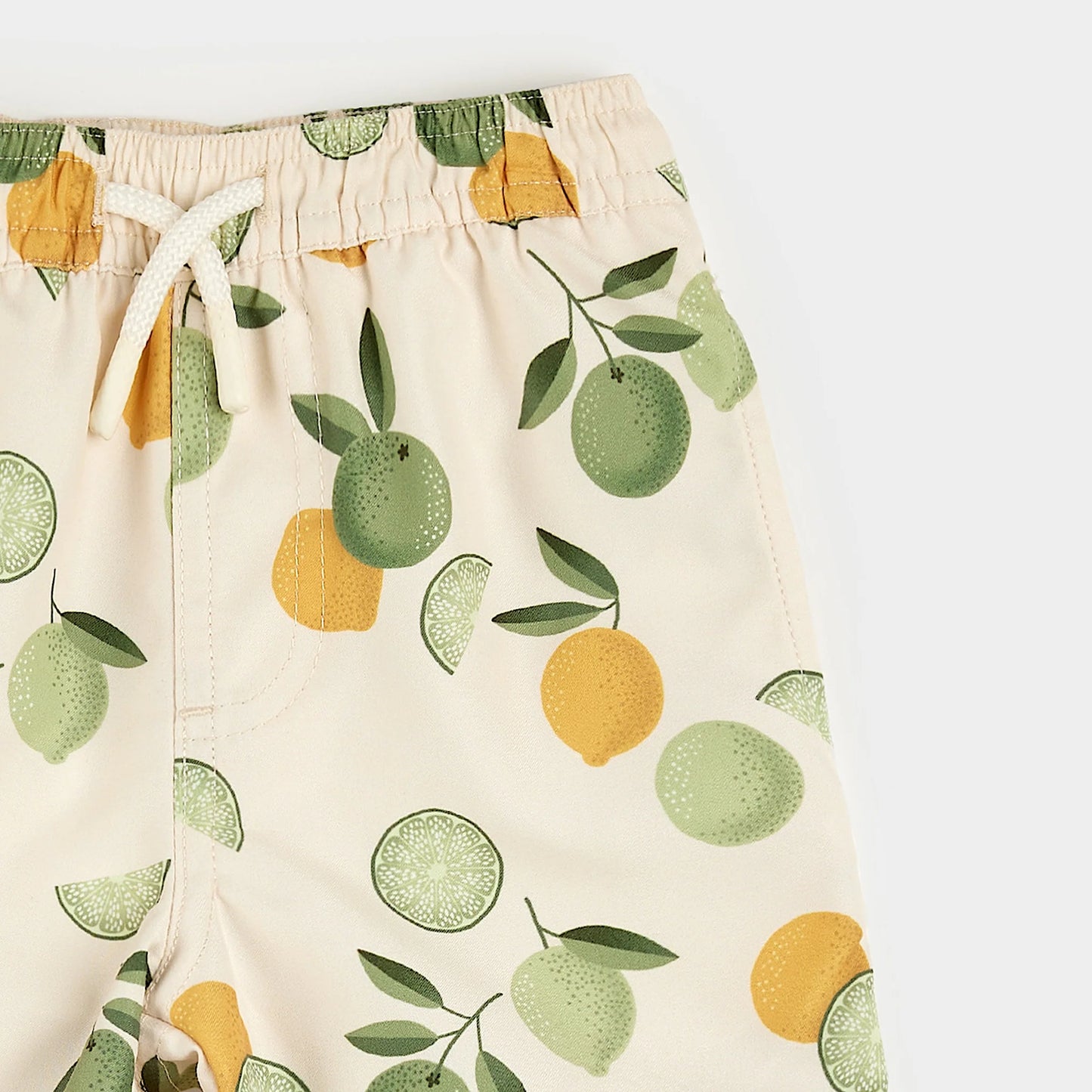 Citrus Print on Antique White Swim Trunks