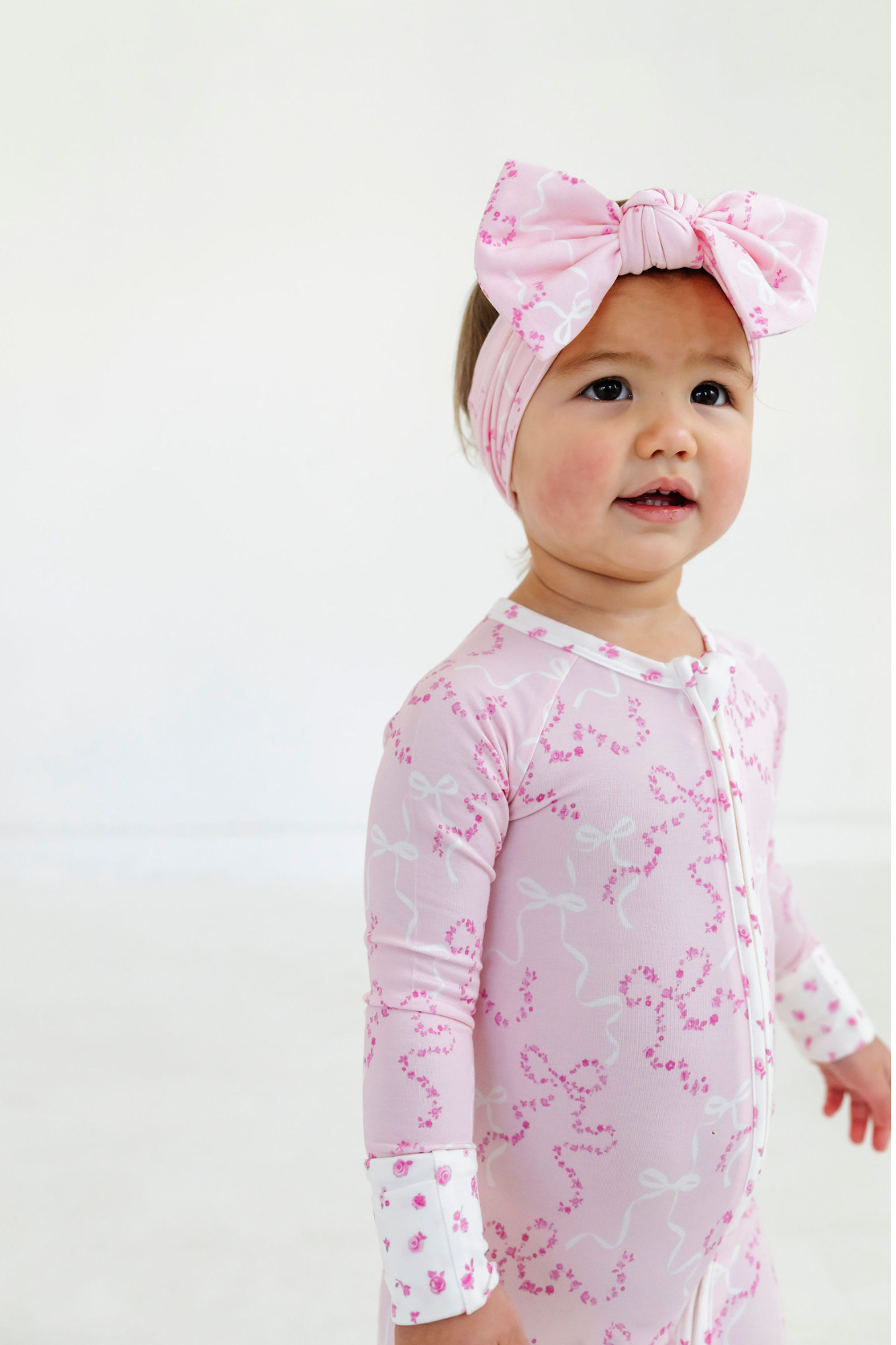 Cora Floral Bow Zipper Romper