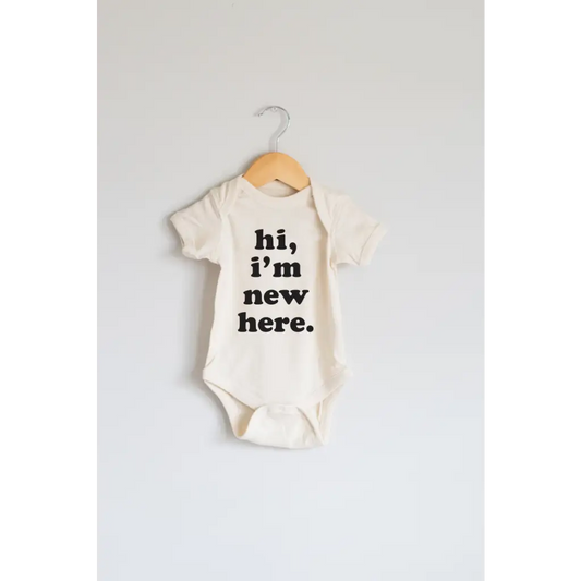 "Hi I'm New Here." Organic Cotton Baby Onesie - Polished Prints