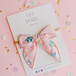 Pink Blue Yellow Floral Small Bow on Nylon Headband - Evie Pearl
